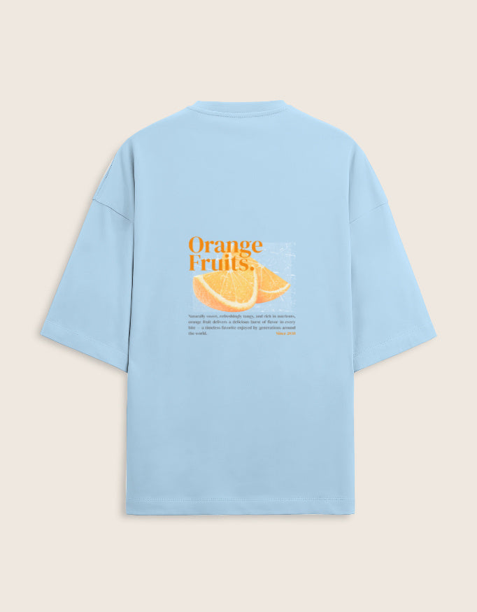 Light blue t-shirt with orange fruit graphic and text on a beige background