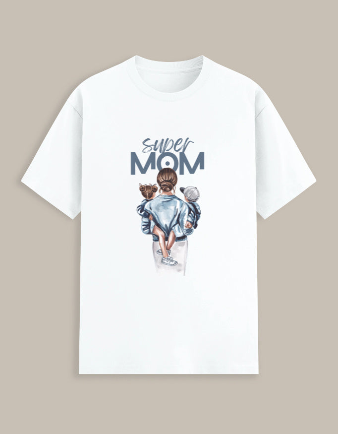 White t-shirt with 'Super Mom' graphic on a beige background